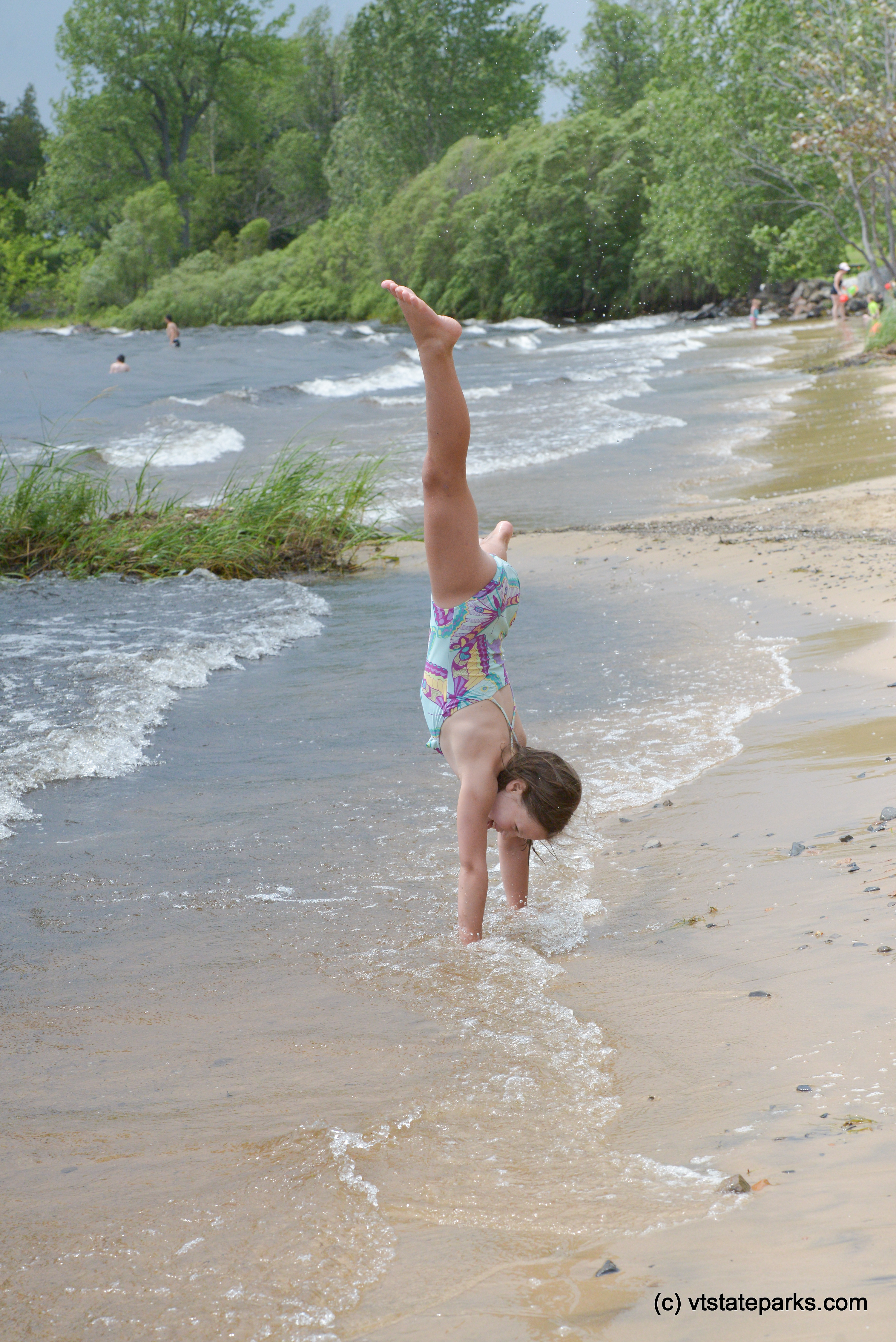 Cartwheel on the beach at Alburgh Dunes State Park by Raven Schwan-Noble