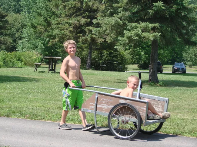 Wheelbarrow ride at Knight Point State Park by Sara Hayes
