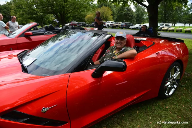 Look at that smile at the car show at Knight Point State Park by Raven Schwan-Noble