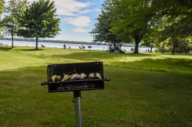 Grilling corn at Knight Point State Park by Raven Schwan-Noble