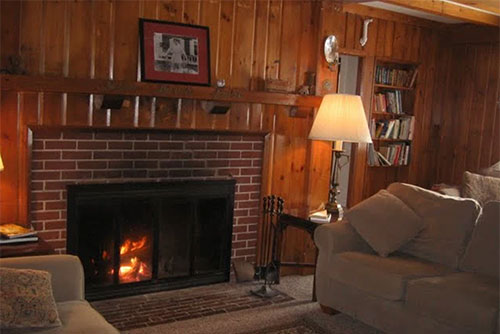 The common room fireplace at Seyon Lodge