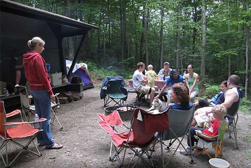 Family lean-to camping at Smugglers' Notch State Park