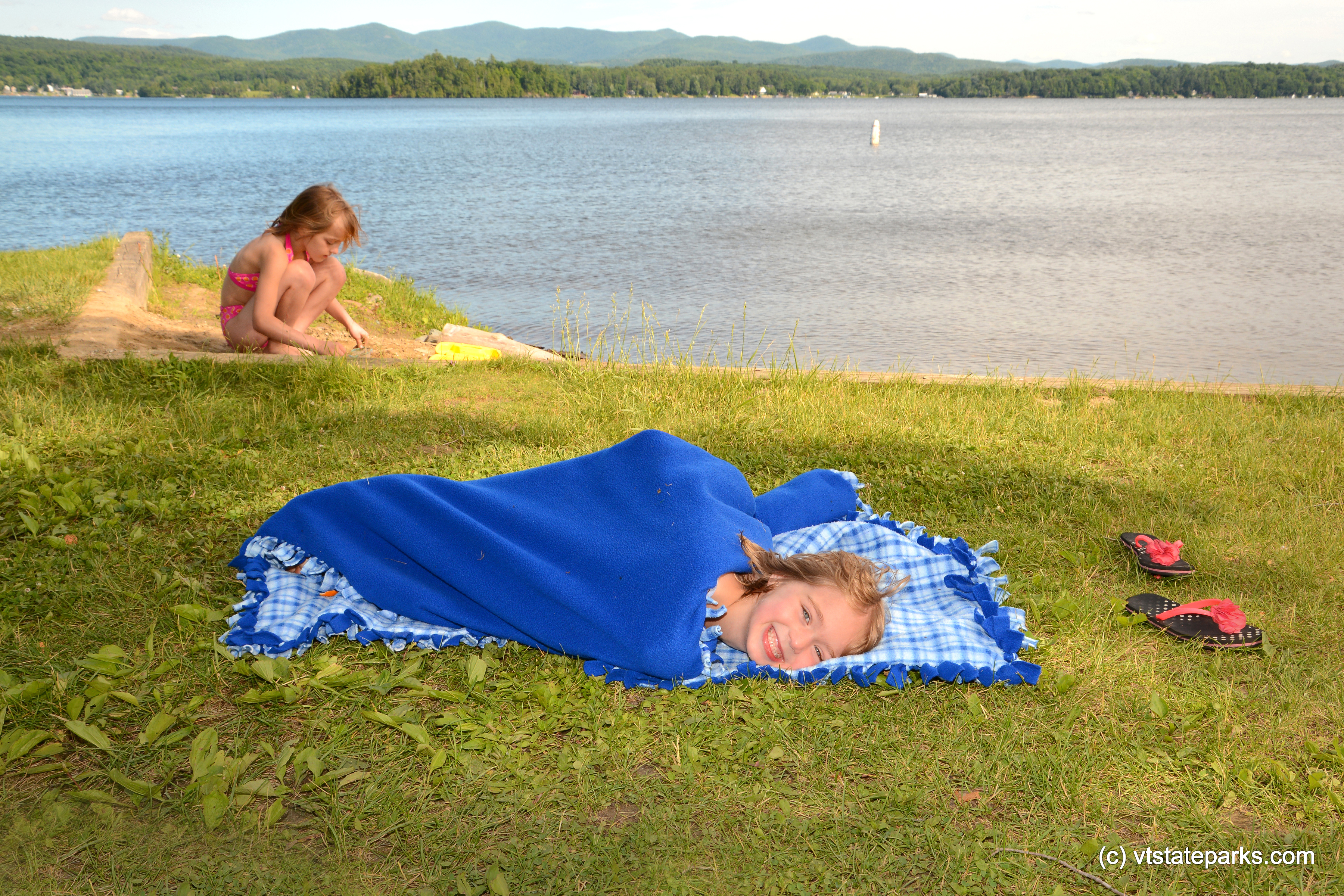 Nap time for one and play time for the other at Bomoseen State Park by Gary Bouchard