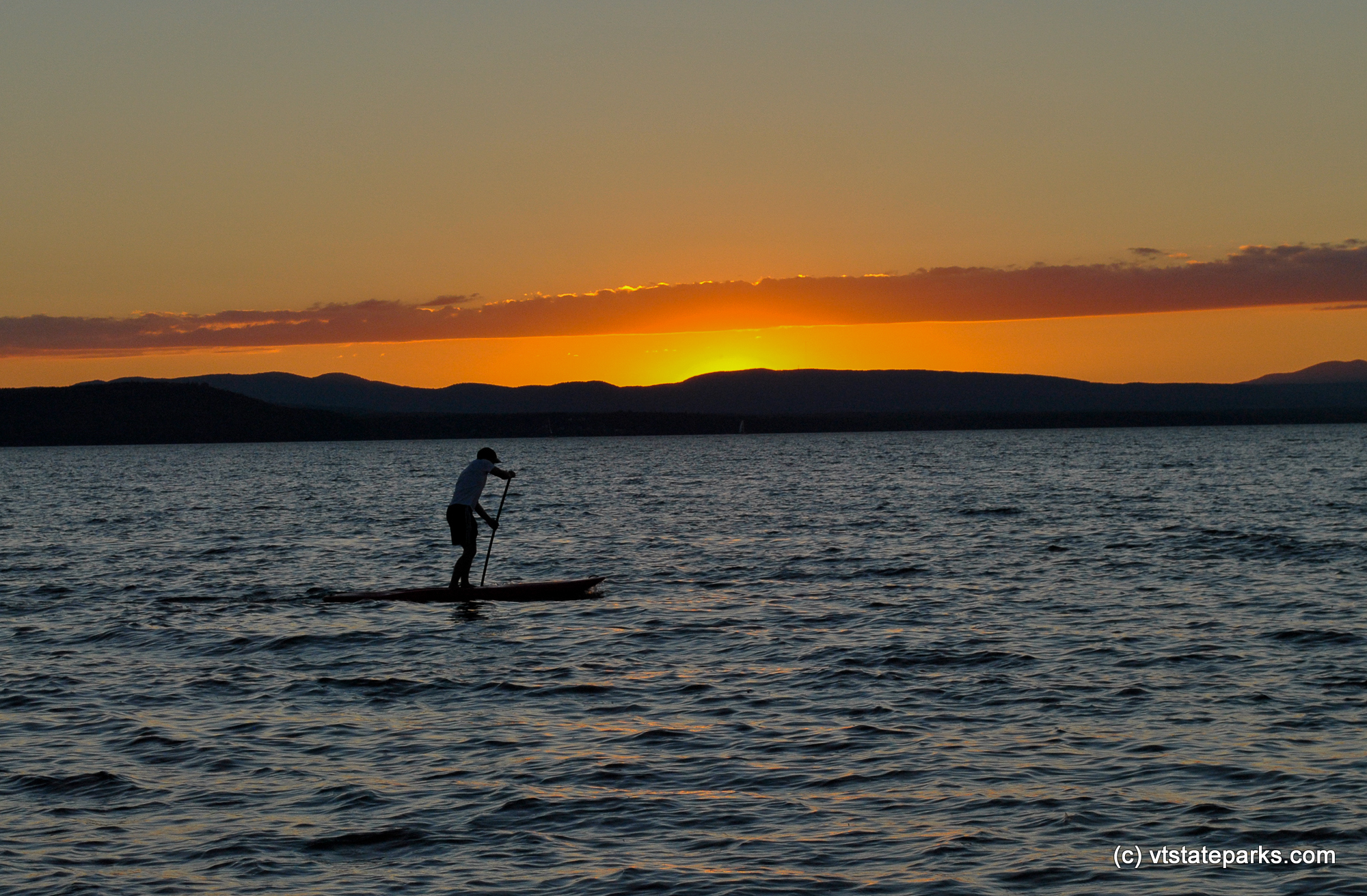 Paddle boating on Lake Champlain from Button Bay Sate Park with a beautiful sunset by Tara Schatz