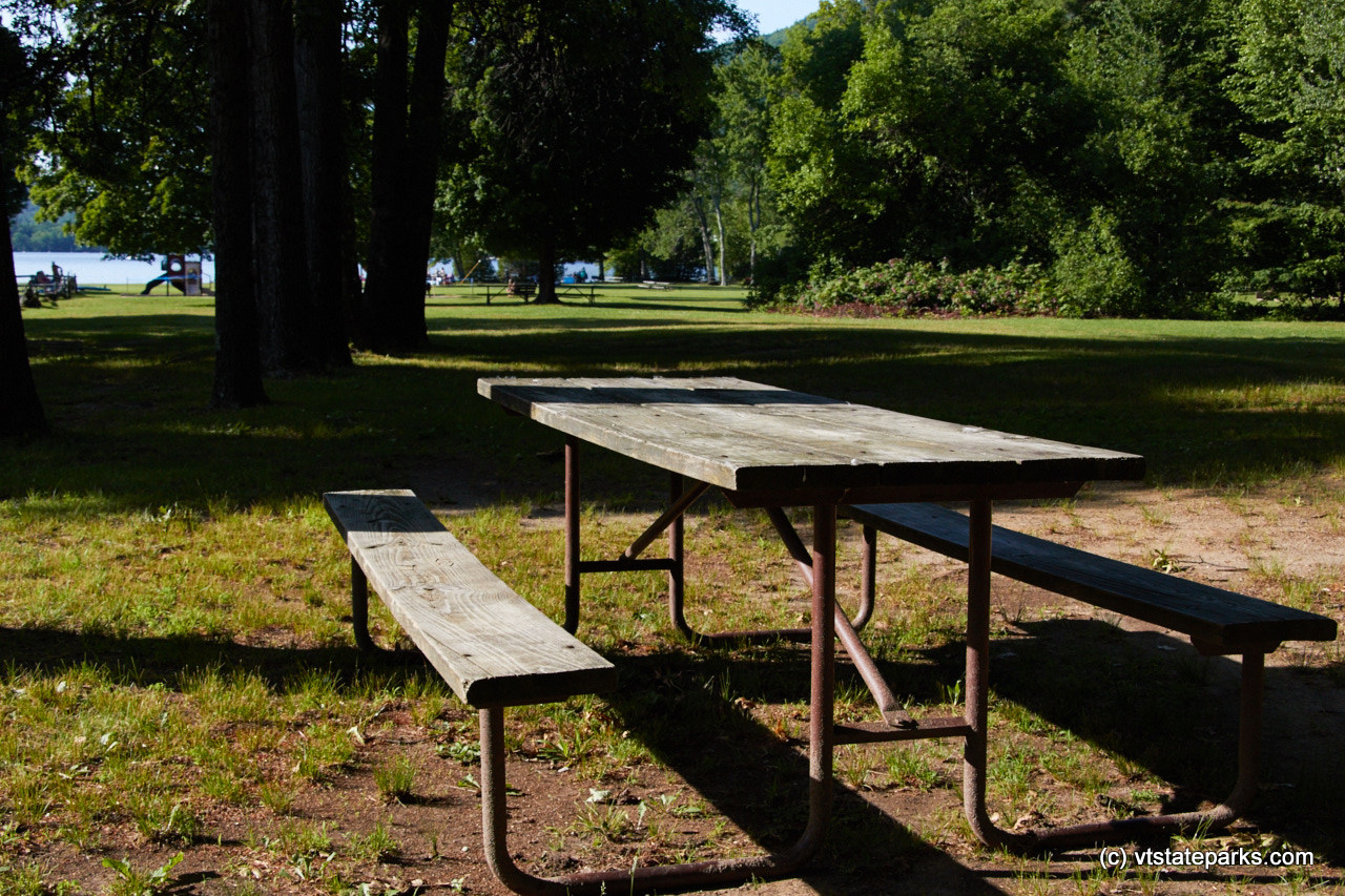 A lonely little picnic table just waiting for someone to join them at Brnbury State Park by Mike Conley