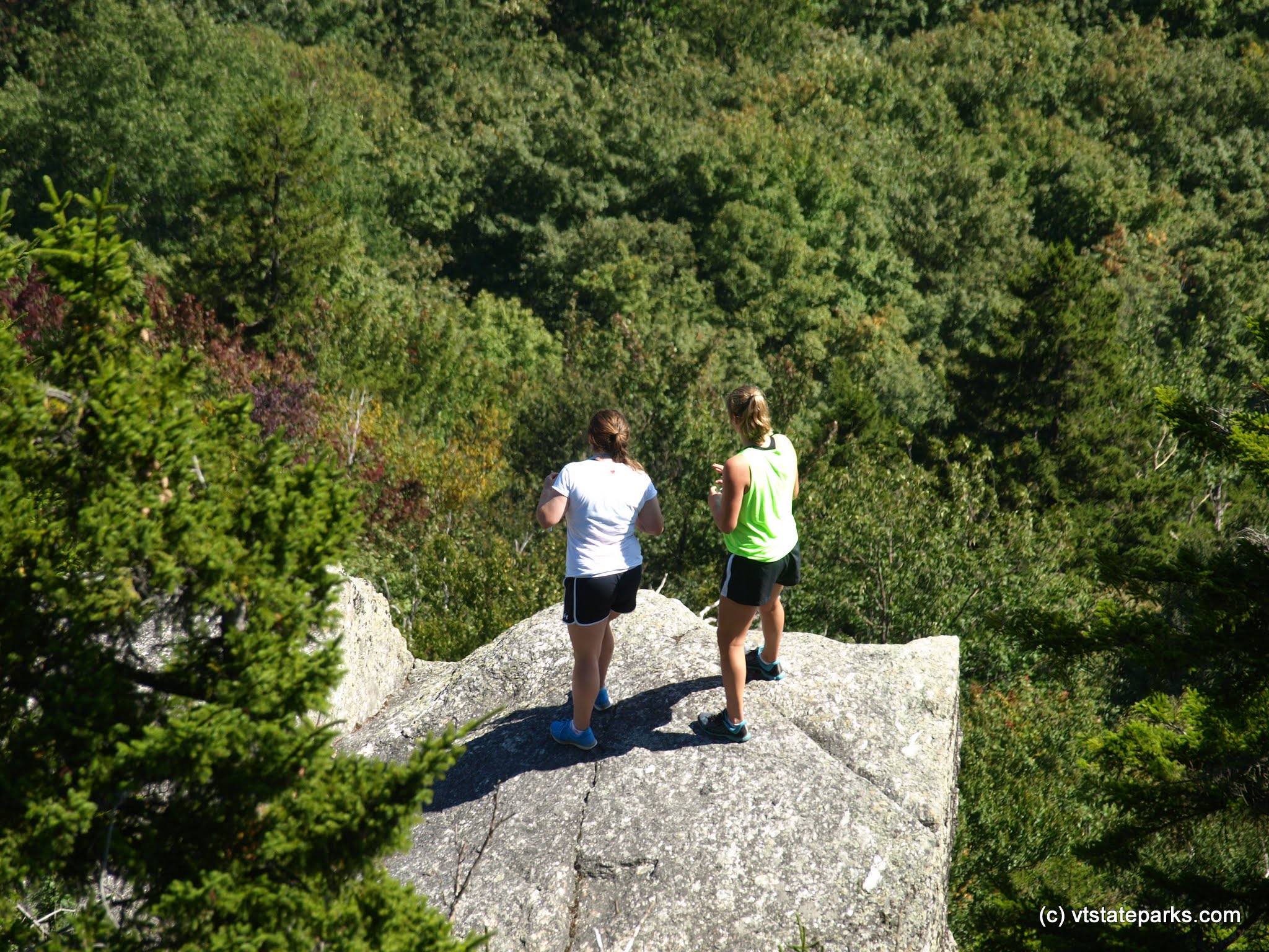 Hikers looking into valley at Elmore State Park by Matt Parsons