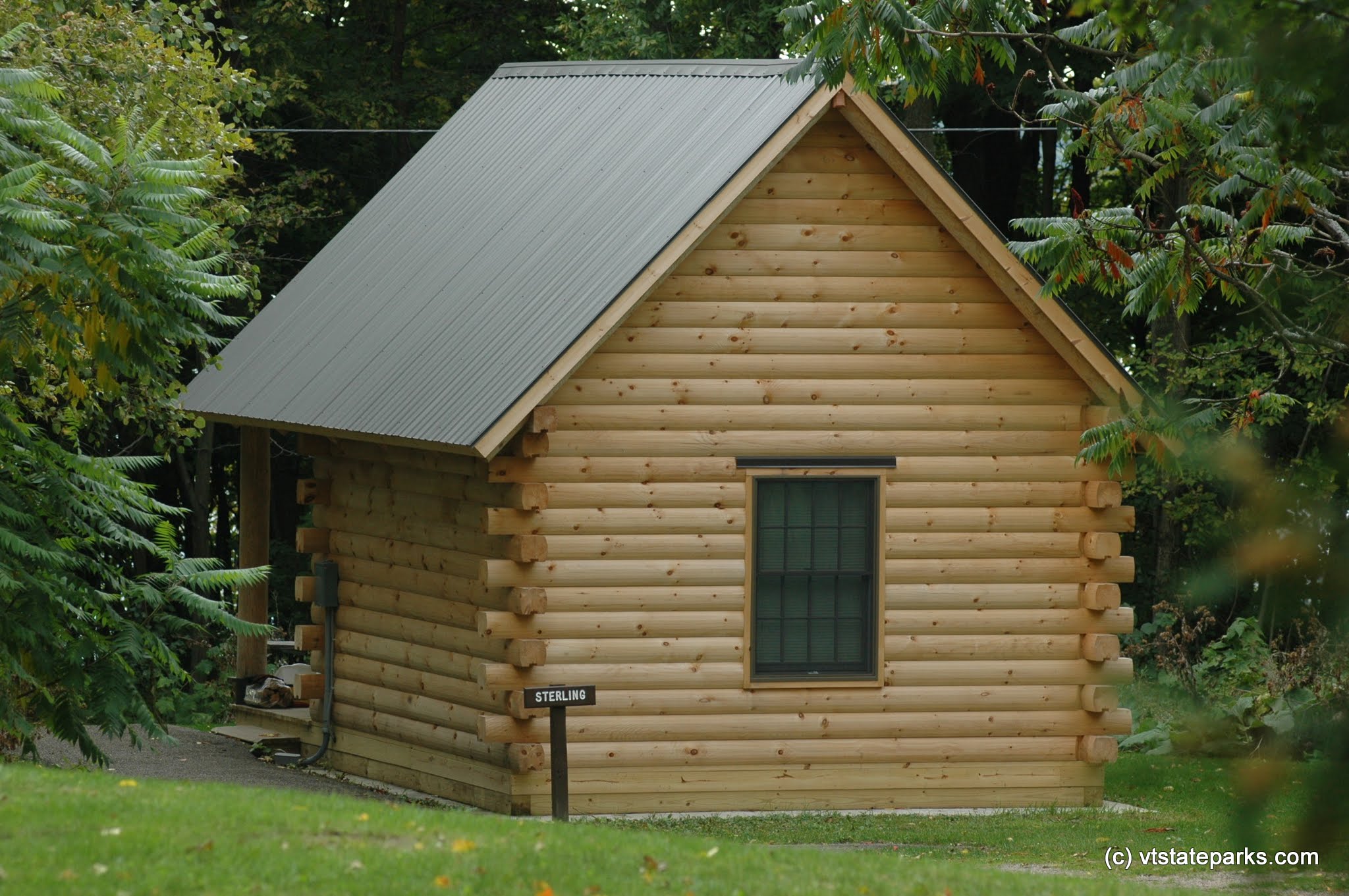 Log cabin at Grand Isle State Park by Patrick Henry
