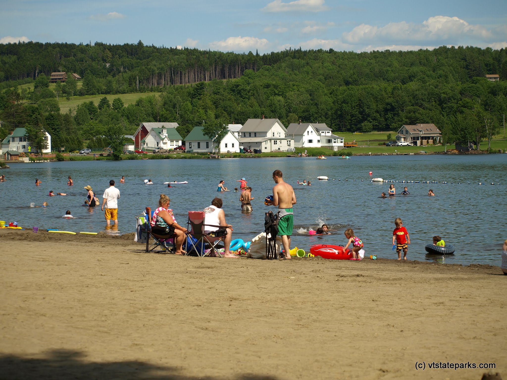 Lots of people enjoying the beach at Elmore State Park by Matt Parsons