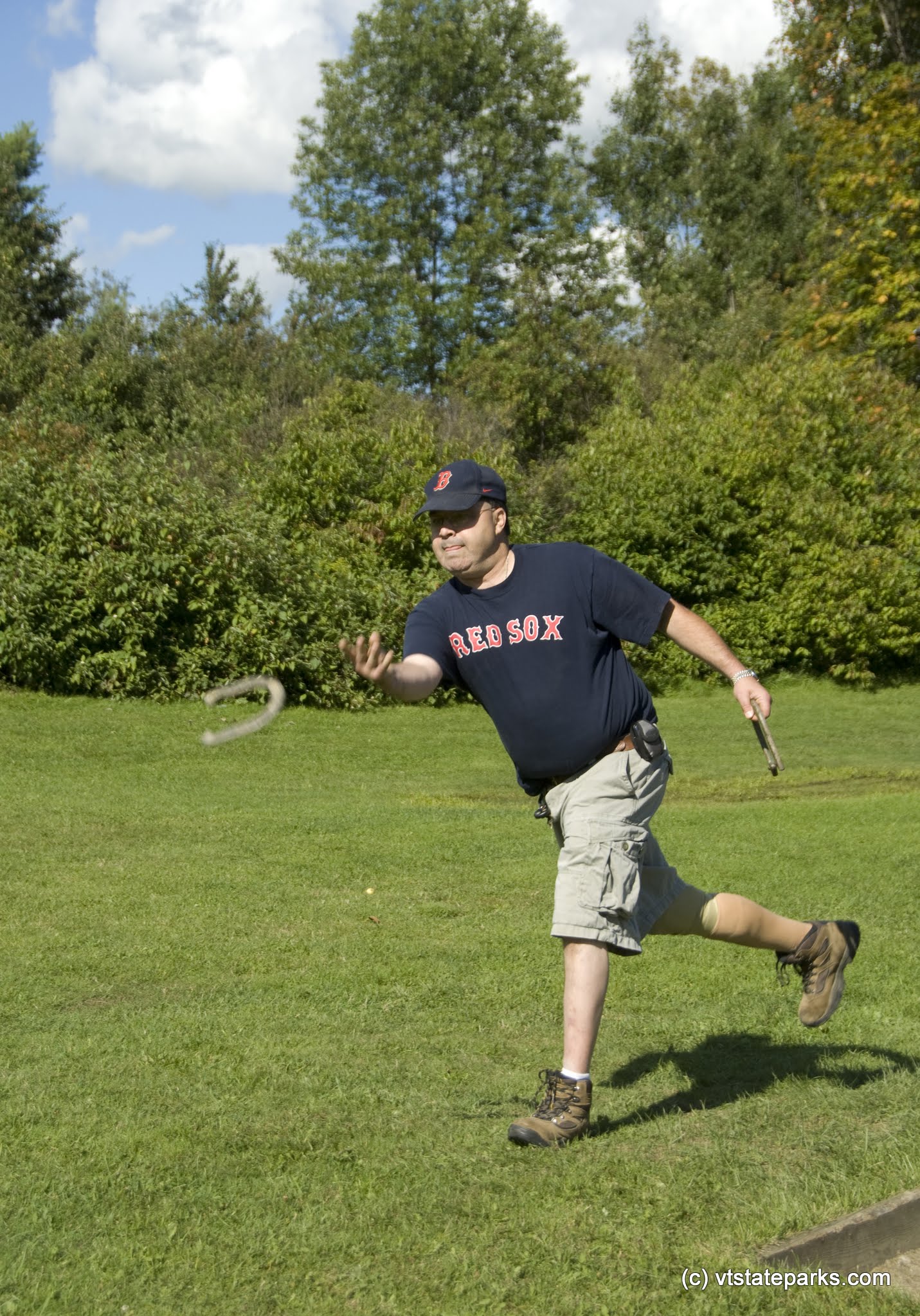 Alan Cusson of Hyde Park, VT plays horseshoes at the Morristown Rescue Squad picnic at Elmore State Park. Photo by Karen Pike