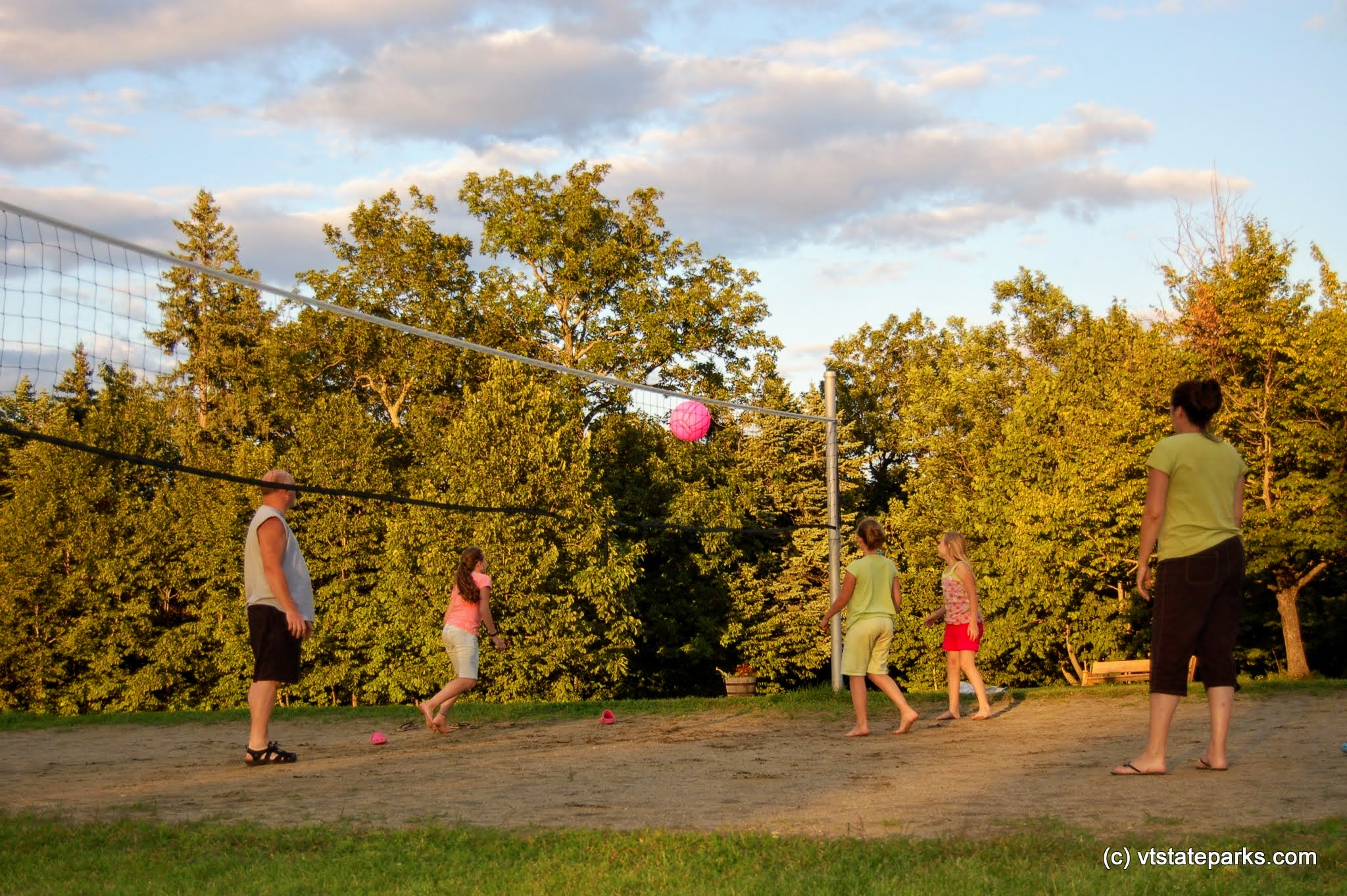 Playing volleyball at Grand Isle State Park by Beth & Brad Herder