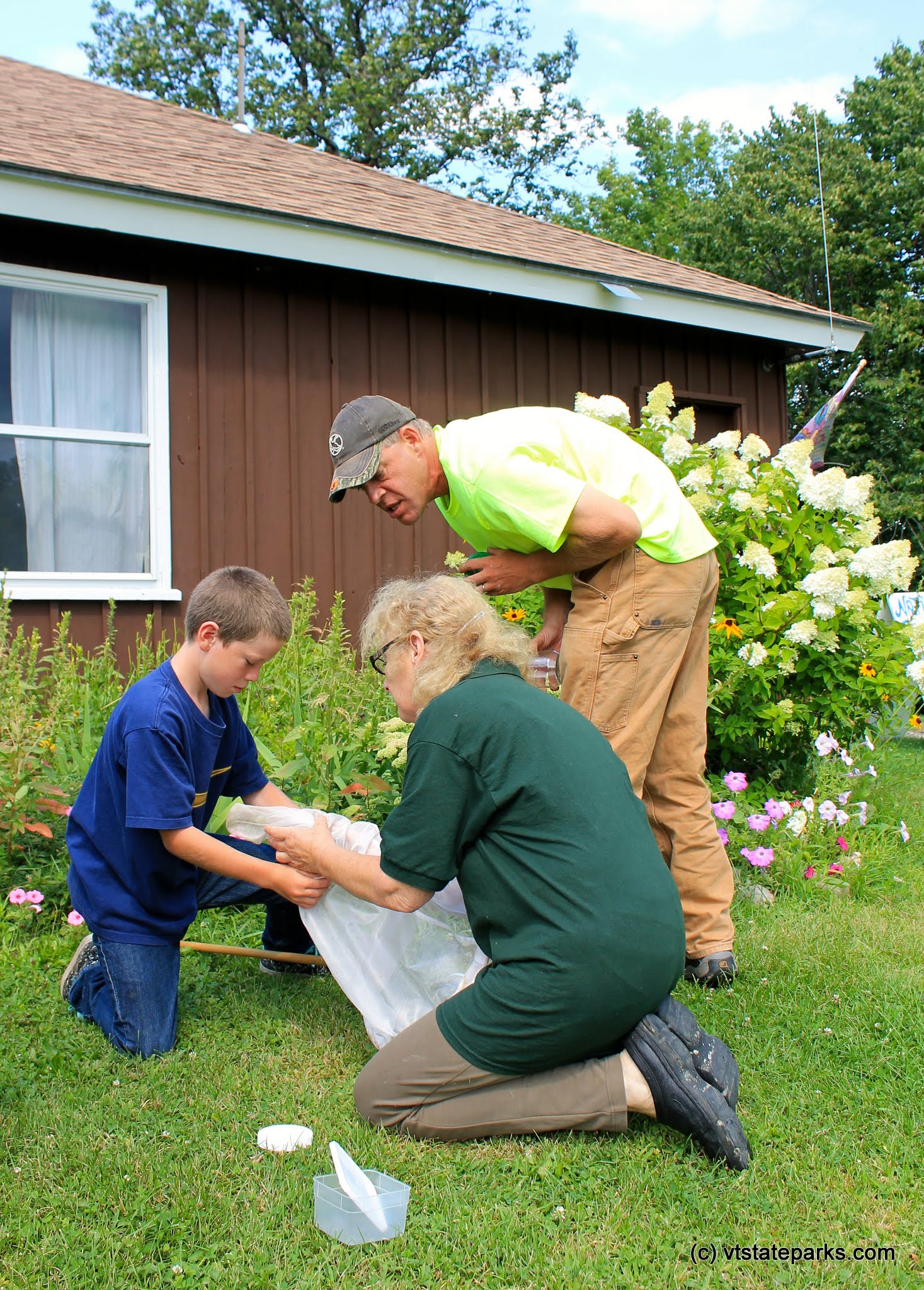 Interpreter with visitors at Grand Isle State Park by Meghan Lynch