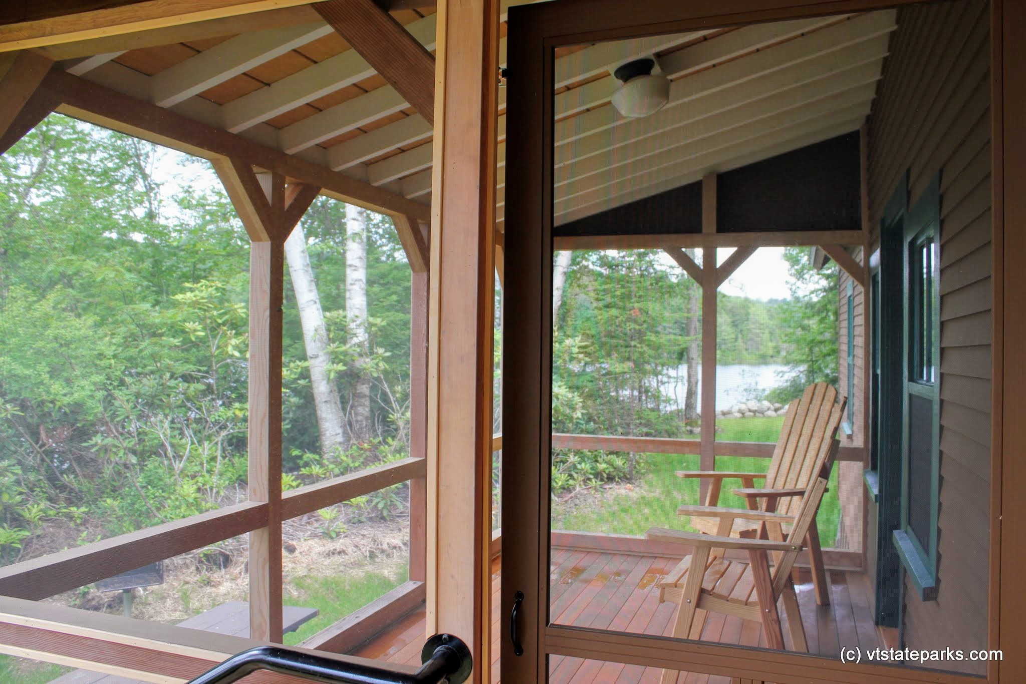 Porch at Perry Merrill cottage at Ricker Pond State Park