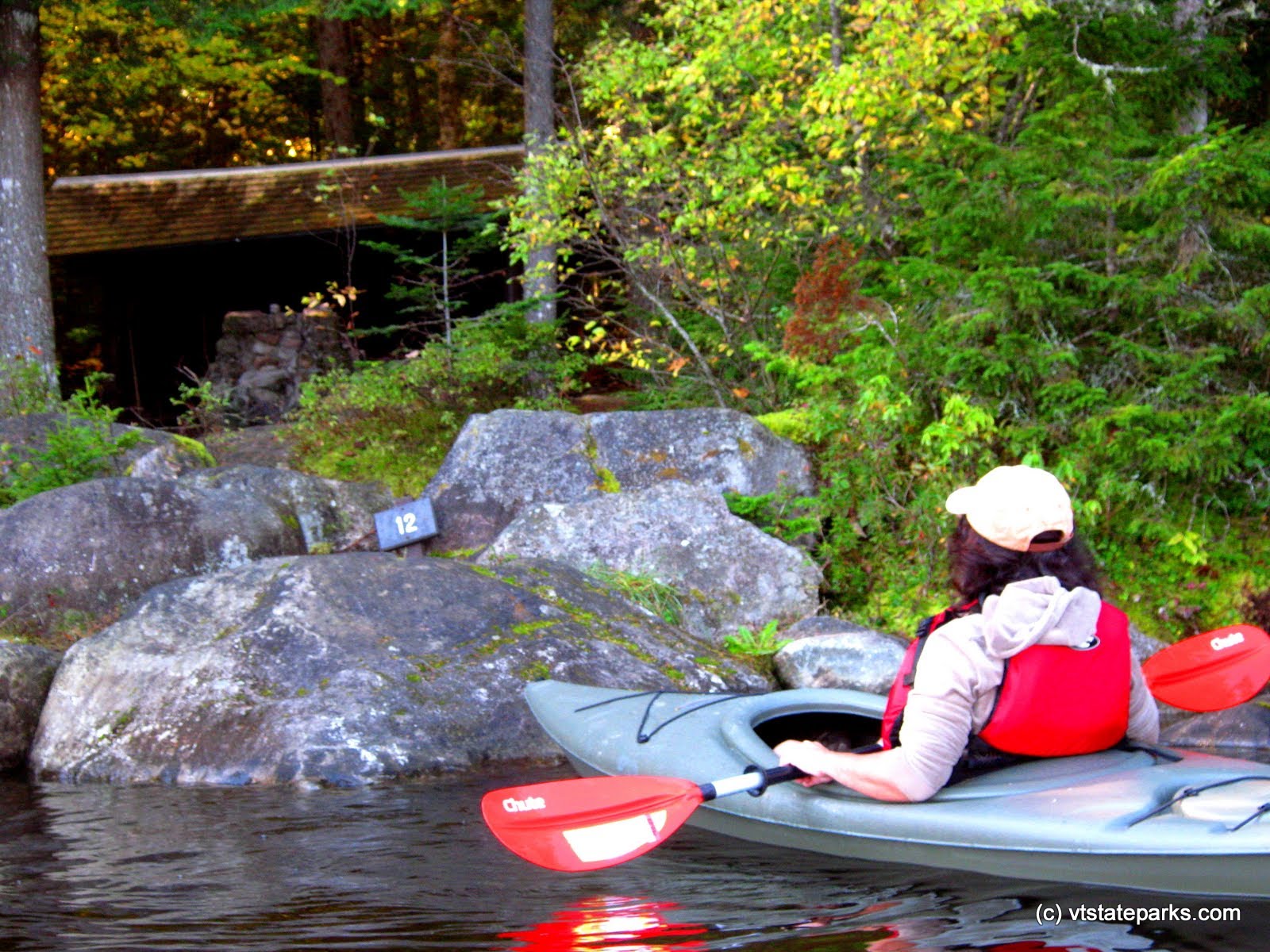 Kayaking by the shore at Kettle Pond by Matt Parsons