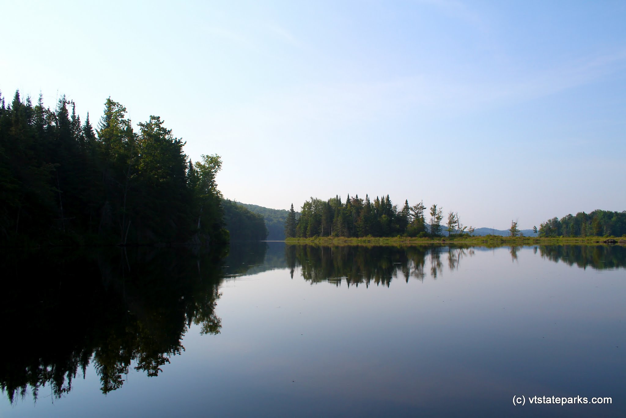 Still water and tree reflections at Green River Reservoir State Park by Jeremiah Johnson