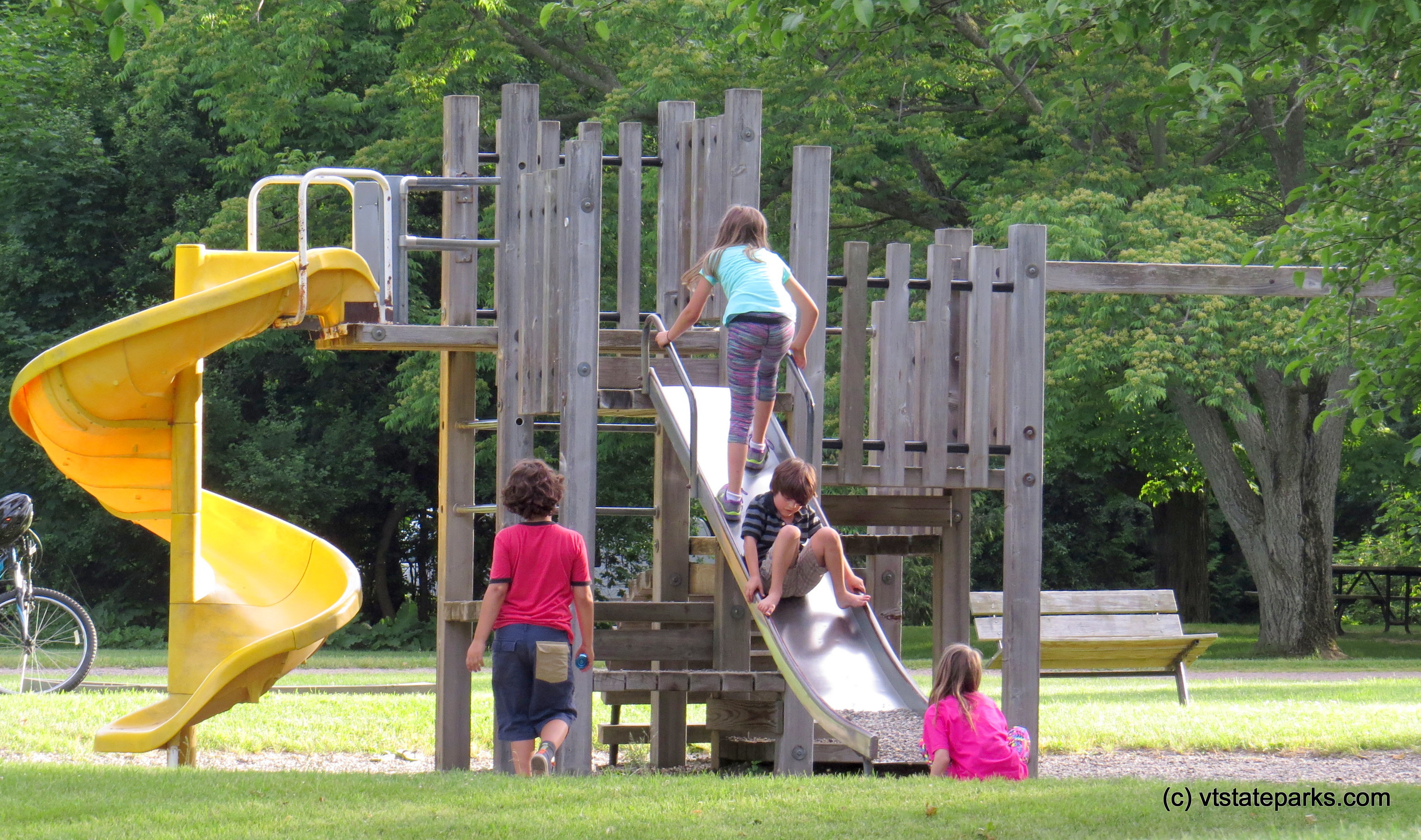 Children enjoying the playground at Grand Isle State Park by Aswini Cherukuri
