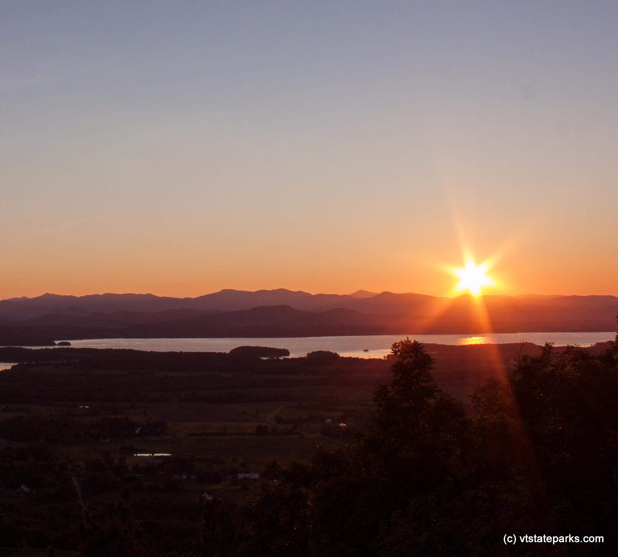 Bright sunset as seen from Mt Philo State Park by Tara Schatz