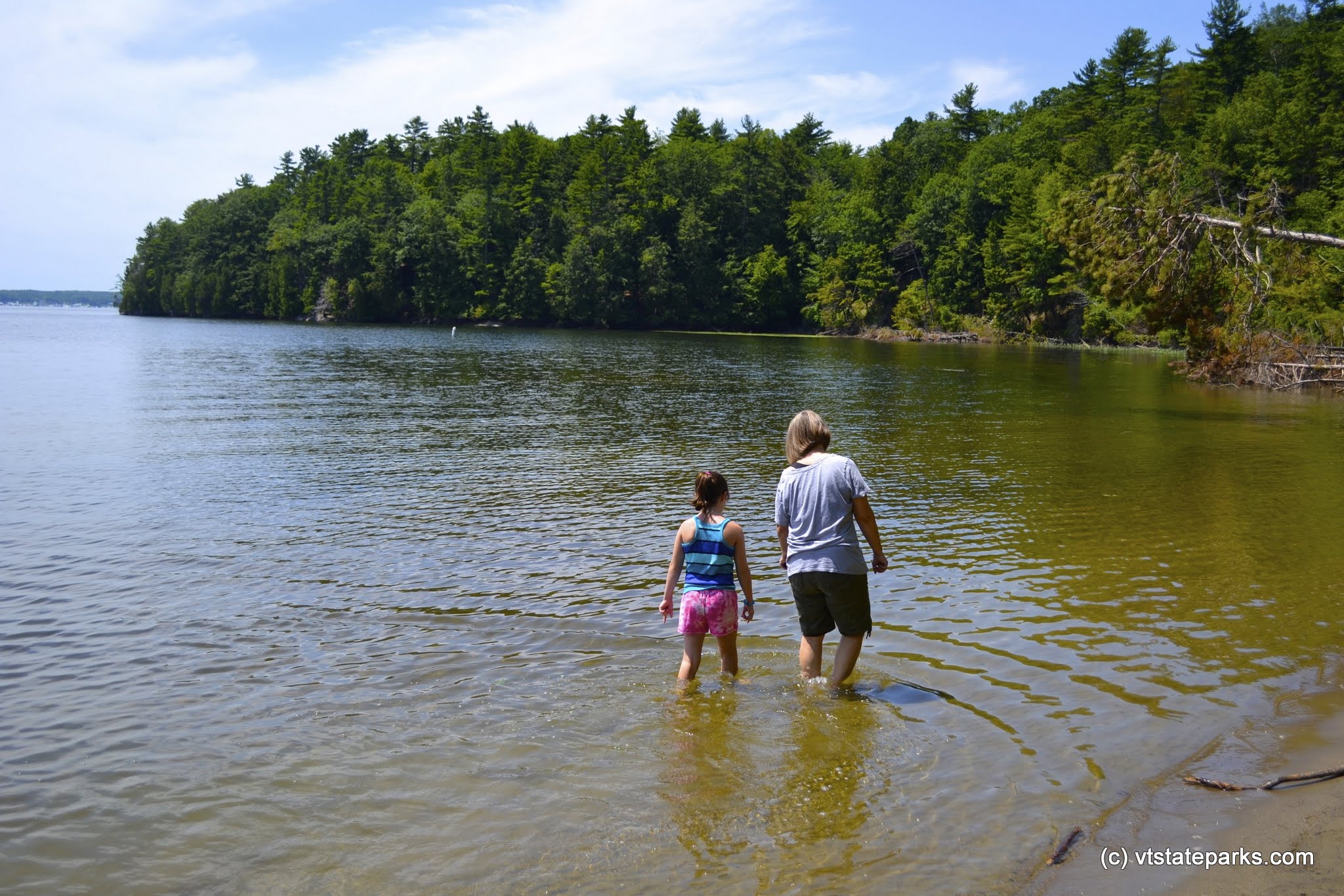 Wading in Niquette Bay State Park by Adam White