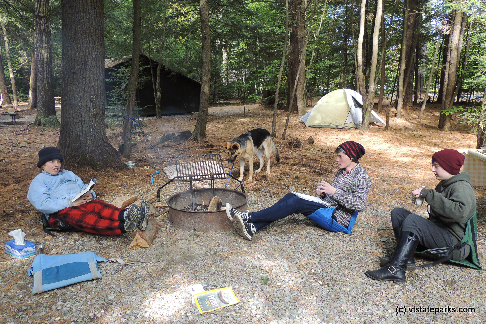 Relaxing by reading and drinking hot chocolate at Quechee State Park by Tara Schatz