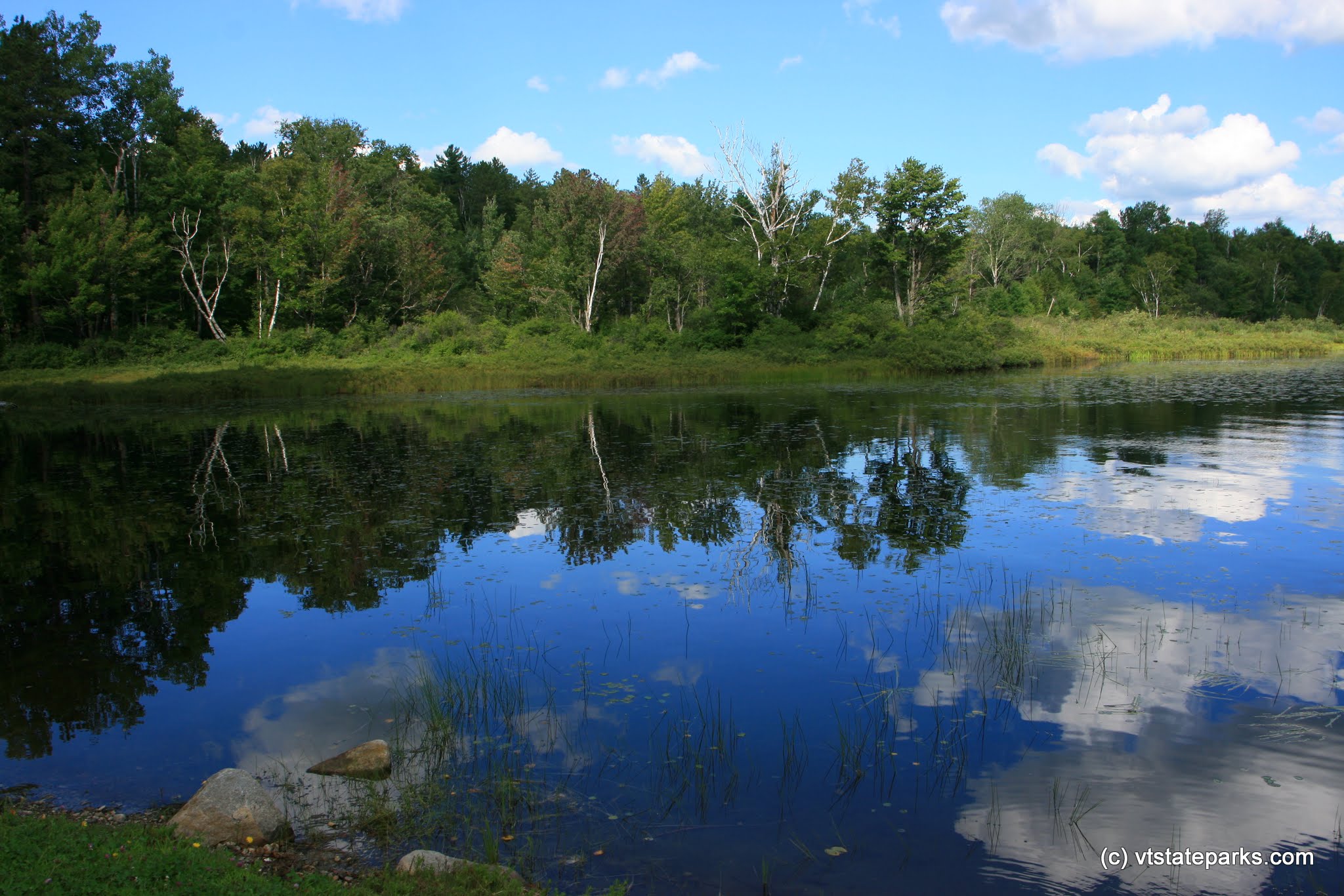 Refections in Spectacle Pond in Brighton State Park