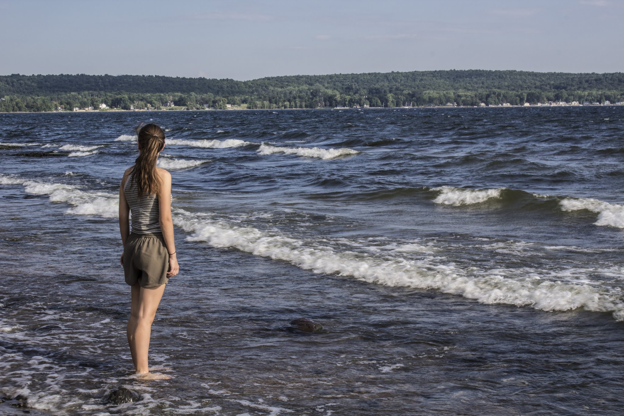 Wading in Lake Champlain at Kamp Kill Kare State Park by Kristen Jensen