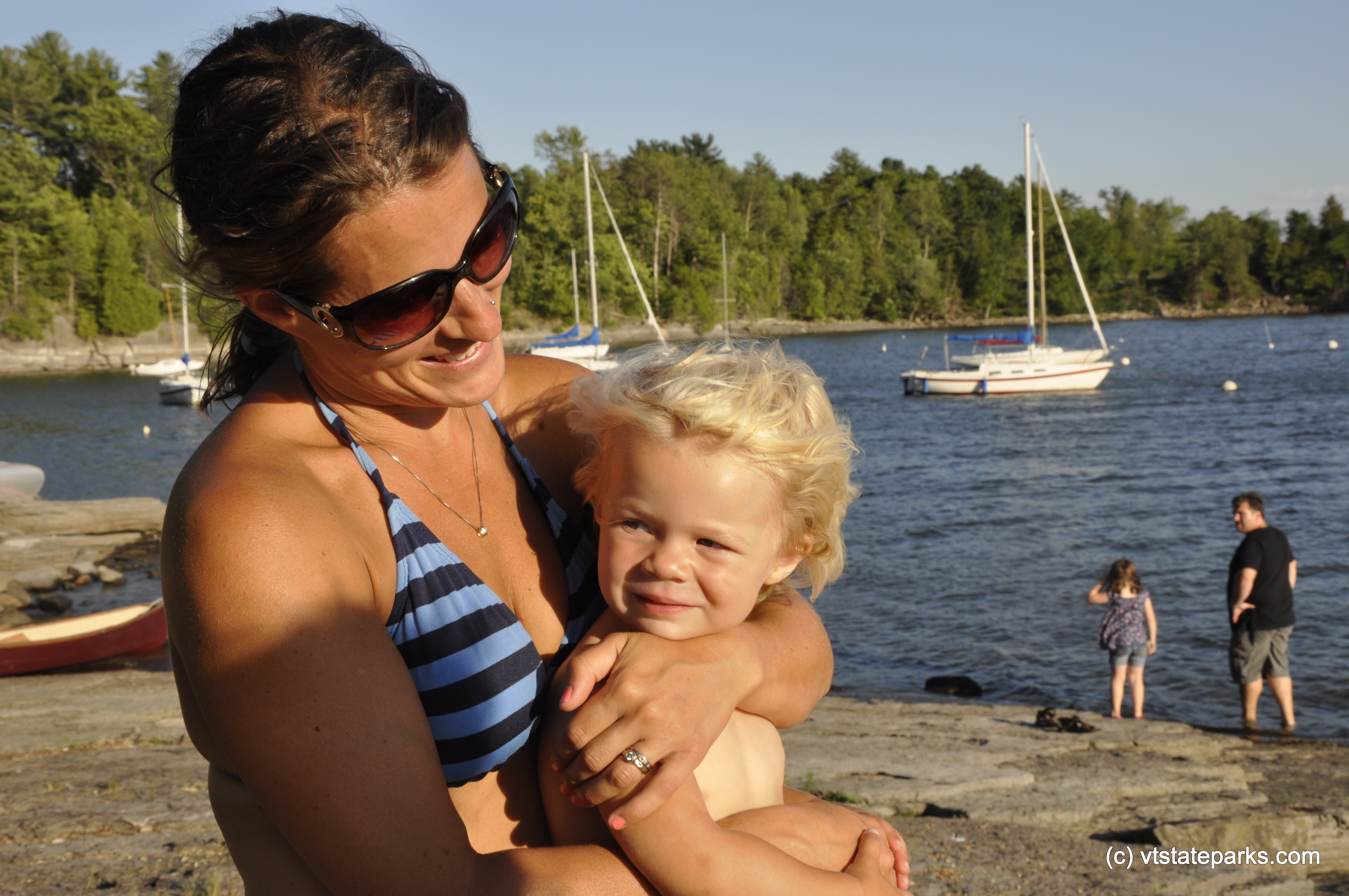 People and boats at Kingsland Bay State Park by Julia Parent