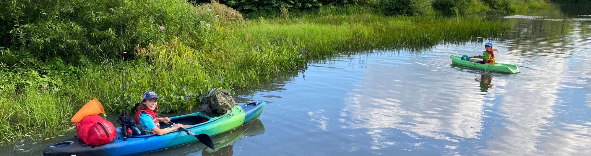Kids kayak in the Reservoir