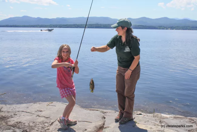 Park Interpreter Christine Paluga leads a Lets Go Fishing event at Button Bay State Park