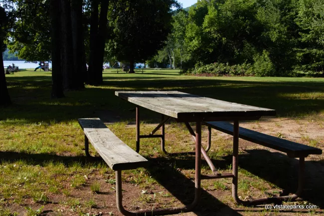 A lonely little picnic table just waiting for someone to join them at Brnbury State Park by Mike Conley