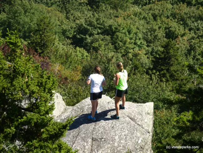 Hikers looking into valley at Elmore State Park by Matt Parsons
