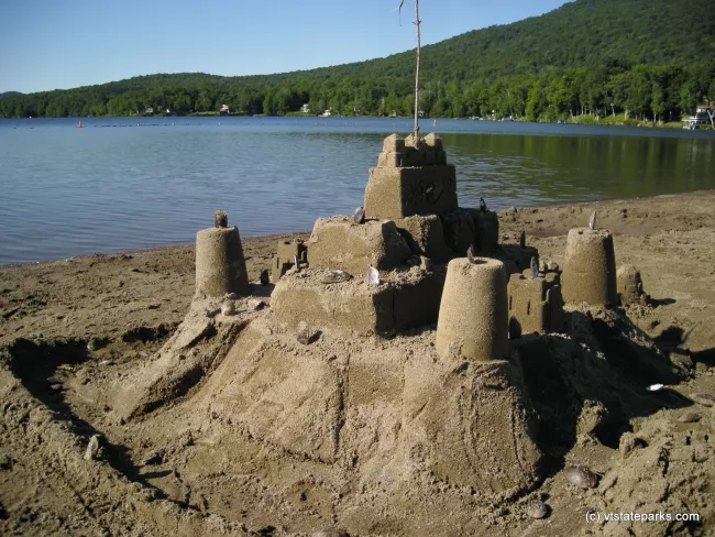 Sandcastle on the beach at Elmore State Park by William Murphy