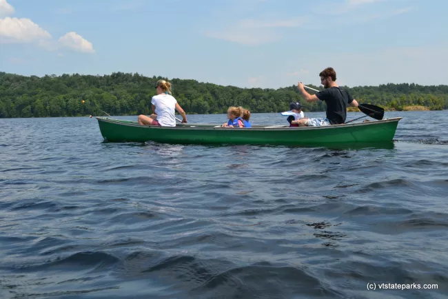 Family canoeing at Green River Reservoir State Park by Alexandra Martin