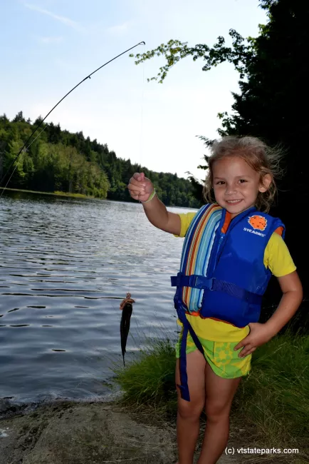 Proud fisherwoman at Green River Reservoir State Park by Alexandra Martin