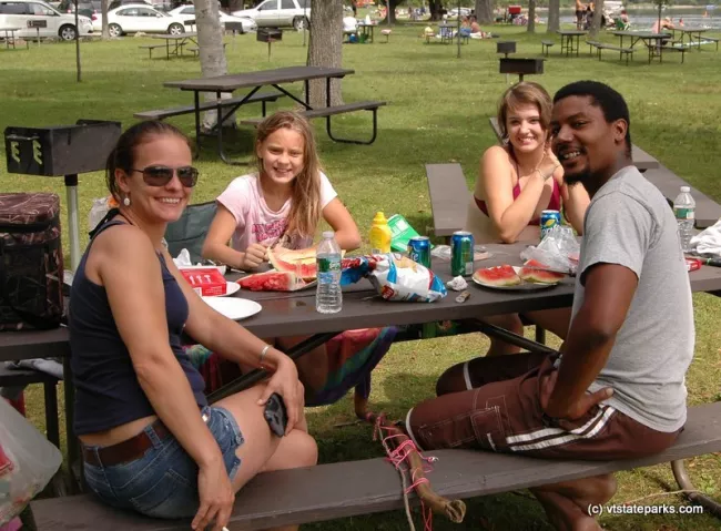 Friends enjoy a picnic at Crystal Lake State Park