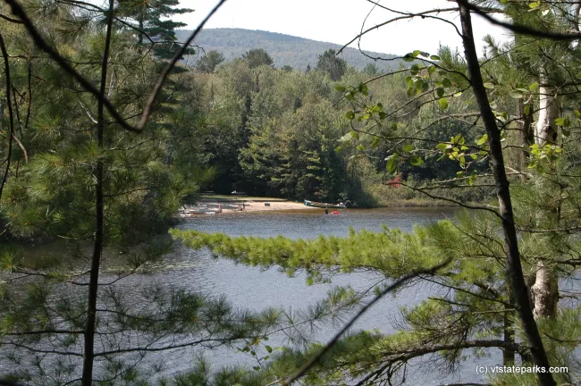 Spectacle Pond through the trees, Brighton State Park
