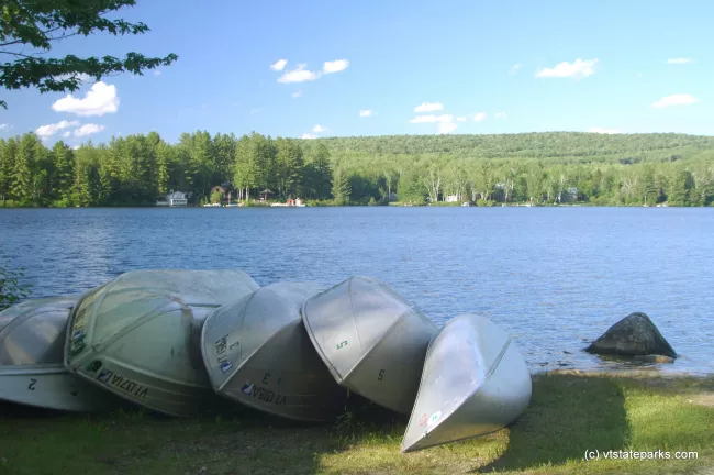 Canoes along the water at Stillwater State Park