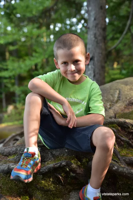 Boy posing for the camera at Woodford State Park by Bill Steele