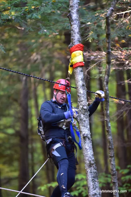 A man prepares for the rope bridge during the Adventure Race 2016 at Jamaica State Park by Bill Steele