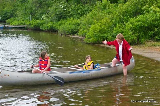 Helping the grandkids canoe at Camp Plymouth State Park