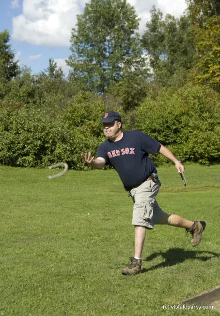 Alan Cusson of Hyde Park, VT plays horseshoes at the Morristown Rescue Squad picnic at Elmore State Park. Photo by Karen Pike