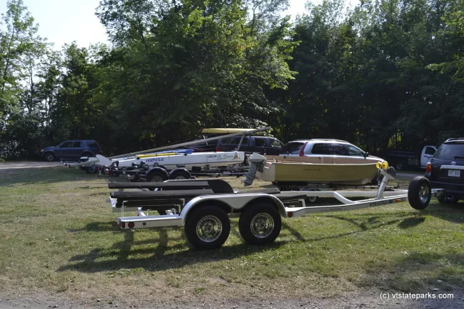 Boats and trailers at Grand Isle State Park by Adam White