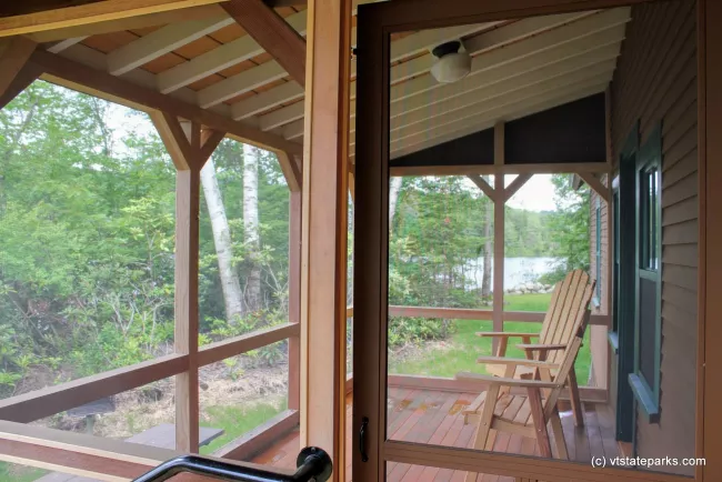 Porch at Perry Merrill cottage at Ricker Pond State Park