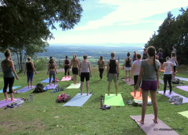 Group yoga at the summit of Mt. Philo State Park by Aswini Cherukuri