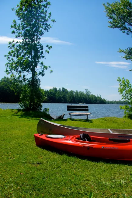 Kayaks onshore at Lake Carmi State Park by Amy Chess