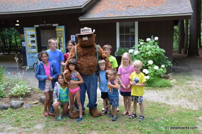 Smokey and kids at the Nature Center at Jamaica State Park by Linda Carlsen-Sperry