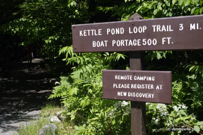 These signs will help you get to the pond to kayak at Kettle Pond State Park by Justin Lajoie