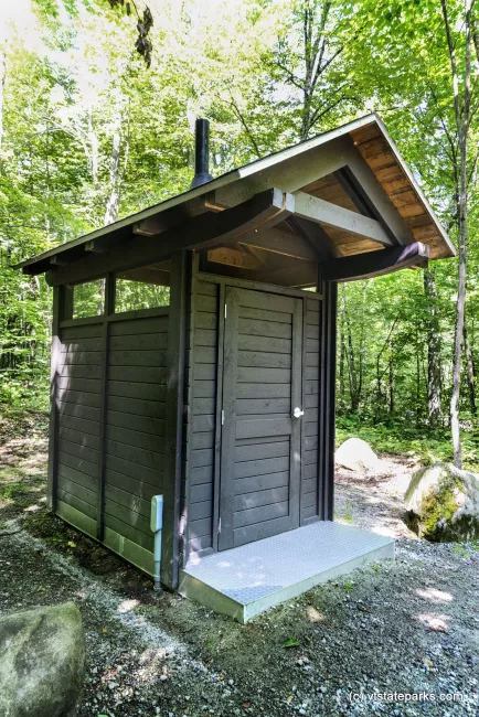 Pit toilet at Kettle Pond State Park by Max Mishkin