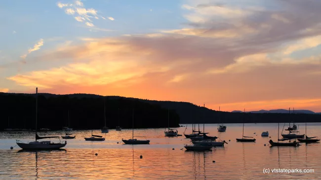 Sky and reflection and boats at Kingsland Bay State Park by Meghan Lynch