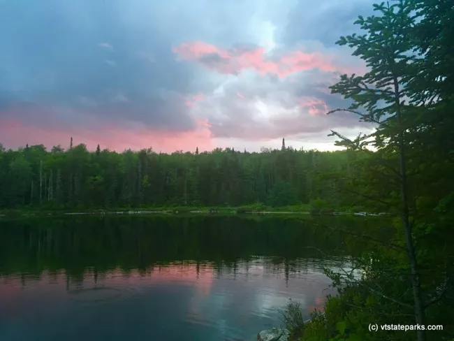 A cotton candy sunset on Osmore Pond in New Discovery State Park by Christie Latour.