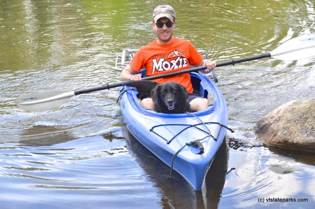 Owner and pet kayaking at Jamaica State Park by Linda Carlsen-Sperry
