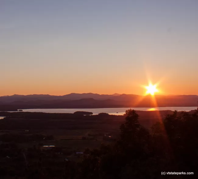 Bright sunset as seen from Mt Philo State Park by Tara Schatz
